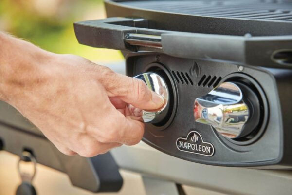 Image of portable griller being switch on